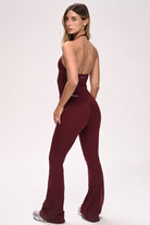 טייץ נשים מתרחב בגזרת V עם כיווצים מחטבים ובטנה כפולה – בד FLOW נושם ונמתח, זמין בגזרות Regular ו-Tall מבית VLIKS